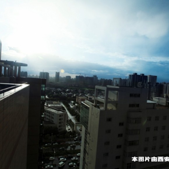 摩尔摄影天台拍摄雨后彩虹